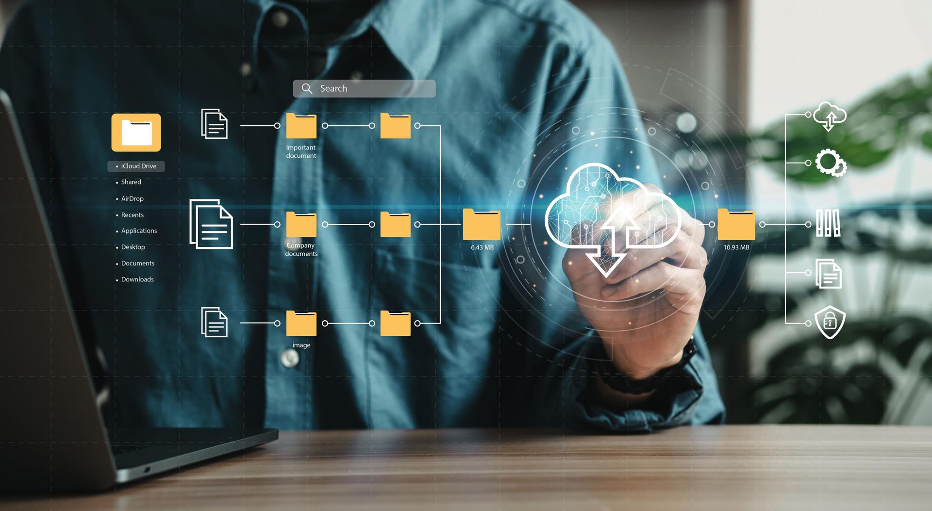 Man using laptop showing cloud computing diagrams digital technology information exchange and future technology ideas Data Document Management System (DMS) Network and Internet Service Concepts